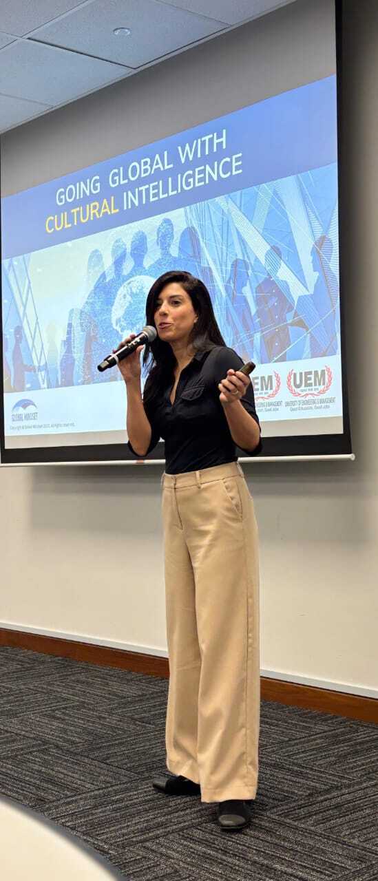 Meital Baruch speaking on stage